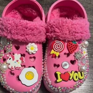 TheseKidsCrocs Can Be Customized With Charms To Reflect Their Own Personal Flair
